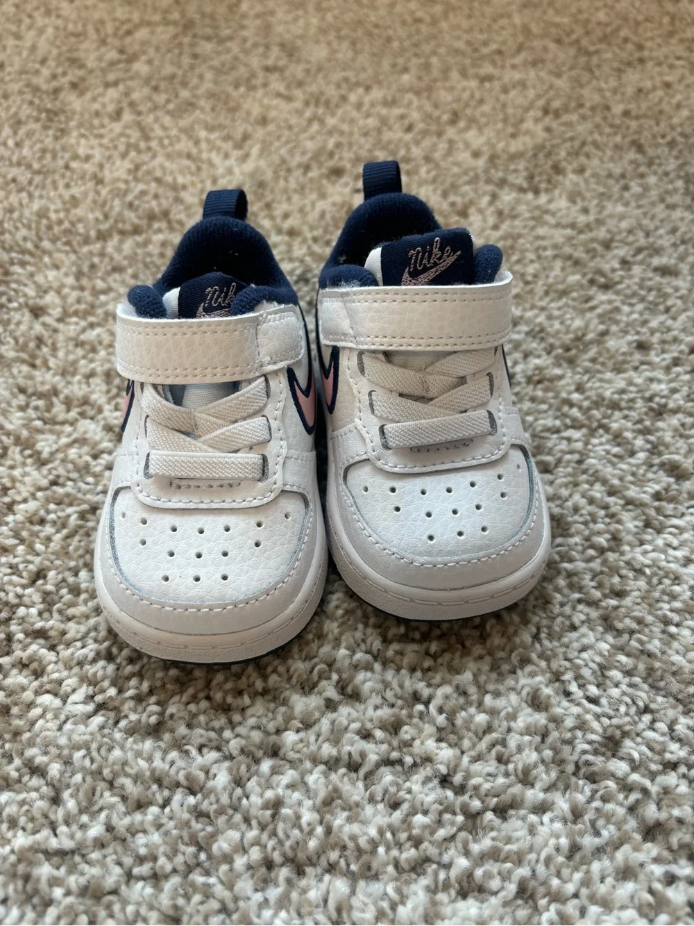 Nike Kids White Sneakers with Navy Lining and Pink Swoosh